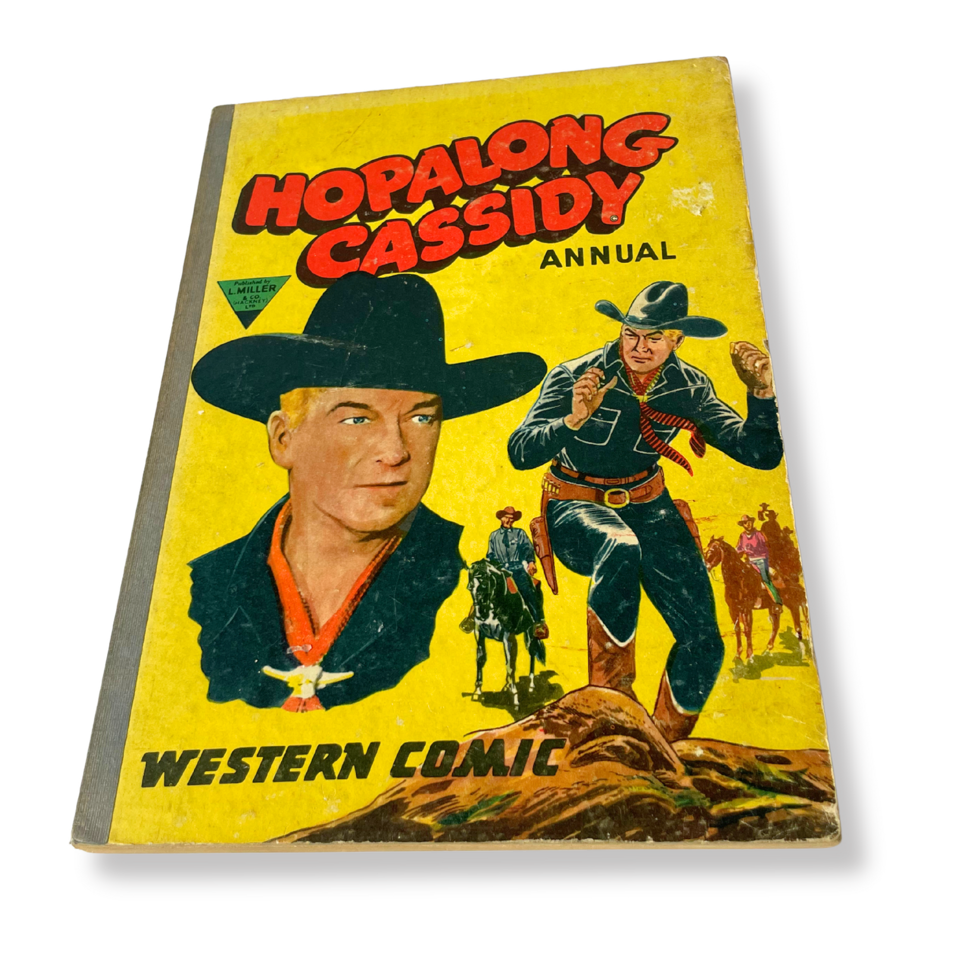Front cover of 1954 Hopalong Cassidy Western Comic Annual No. 1 by L. Miller & Co showing William Boyd in a black cowboy hat.