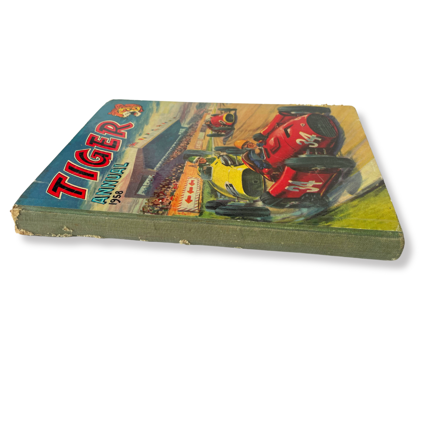Vintage book titled 'Tiger Annual' with colorful illustrations on a white background
